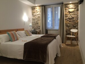 Doppel- oder Zweibettzimmer