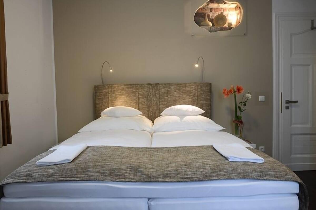 Literie de qualité supérieure, coffres-forts dans les chambres