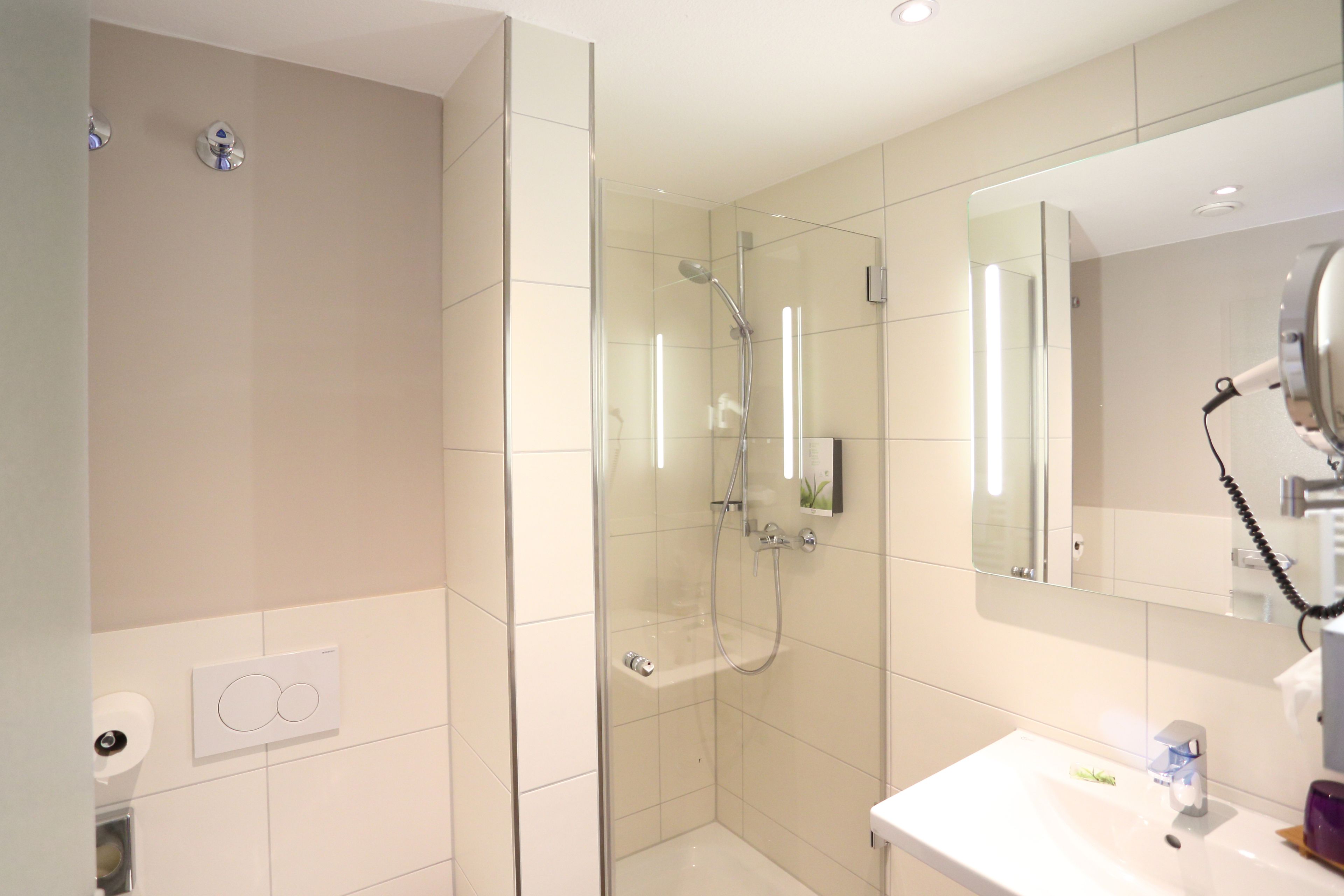 shower, eco-friendly toiletries, hair dryer, towels