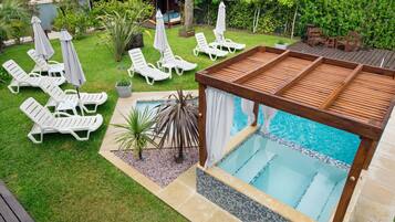 Seasonal outdoor pool, pool umbrellas, sun loungers