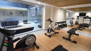 A modern gym with various exercise equipment, including treadmills, stationary bikes, and weight machines. - KALI Ciudadela Mexico City (Mexico City)