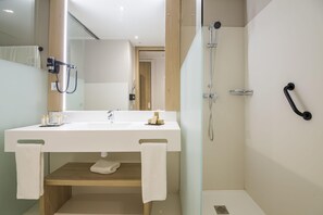 Shower, free toiletries, hair dryer, towels