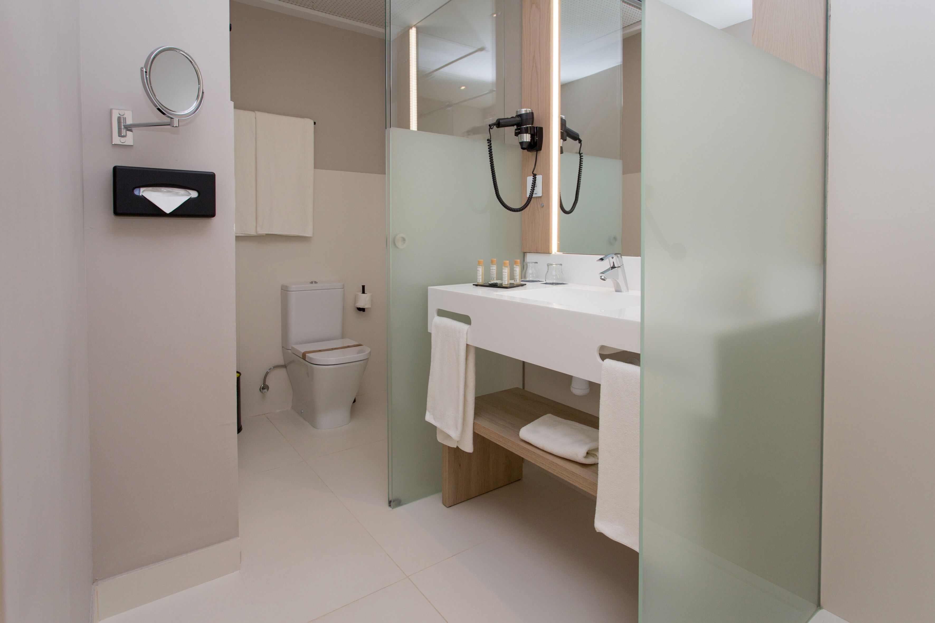 shower, free toiletries, hair dryer, towels