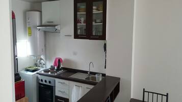 Family Apartment, 2 Bedrooms, Private Bathroom | Private kitchen | Fridge, oven, stovetop, cookware/dishes/utensils