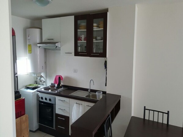 Family Apartment, 2 Bedrooms, Private Bathroom | Private kitchen | Fridge, oven, stovetop, cookware/dishes/utensils