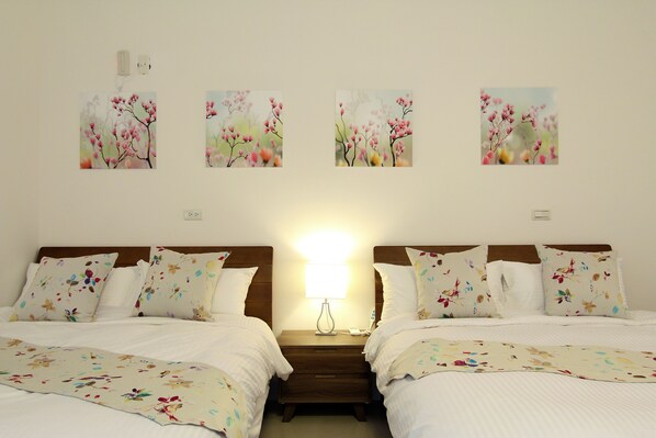 Premium bedding, down duvets, blackout curtains, rollaway beds