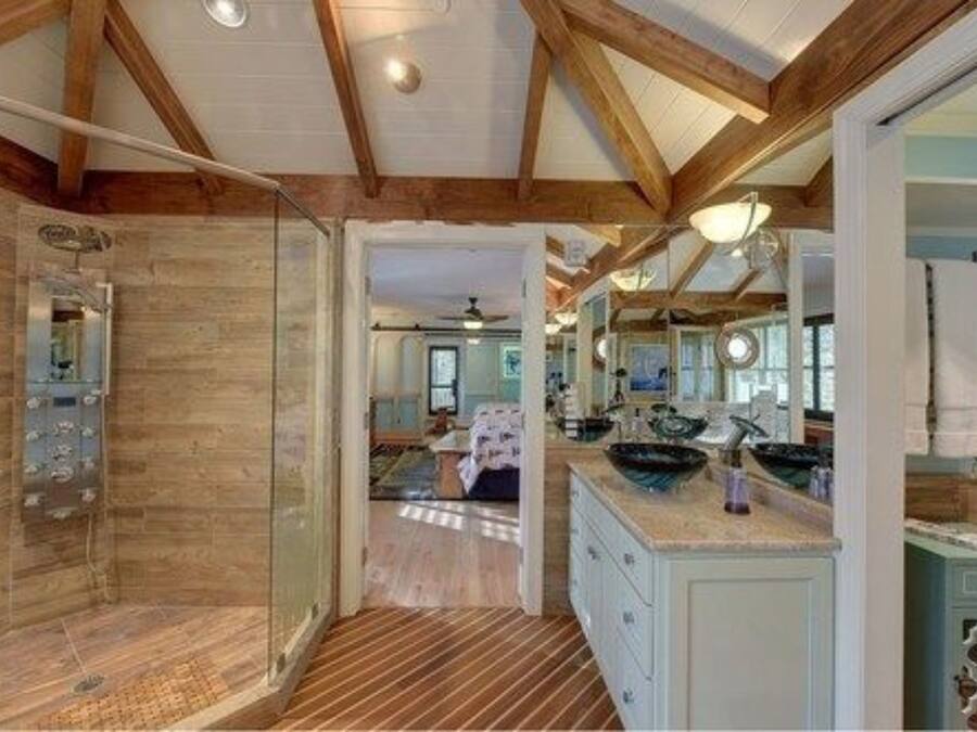 Deluxe Room, Private Bathroom (Melody's Mooring) | Bathroom | Rainfall showerhead, hair dryer, towels