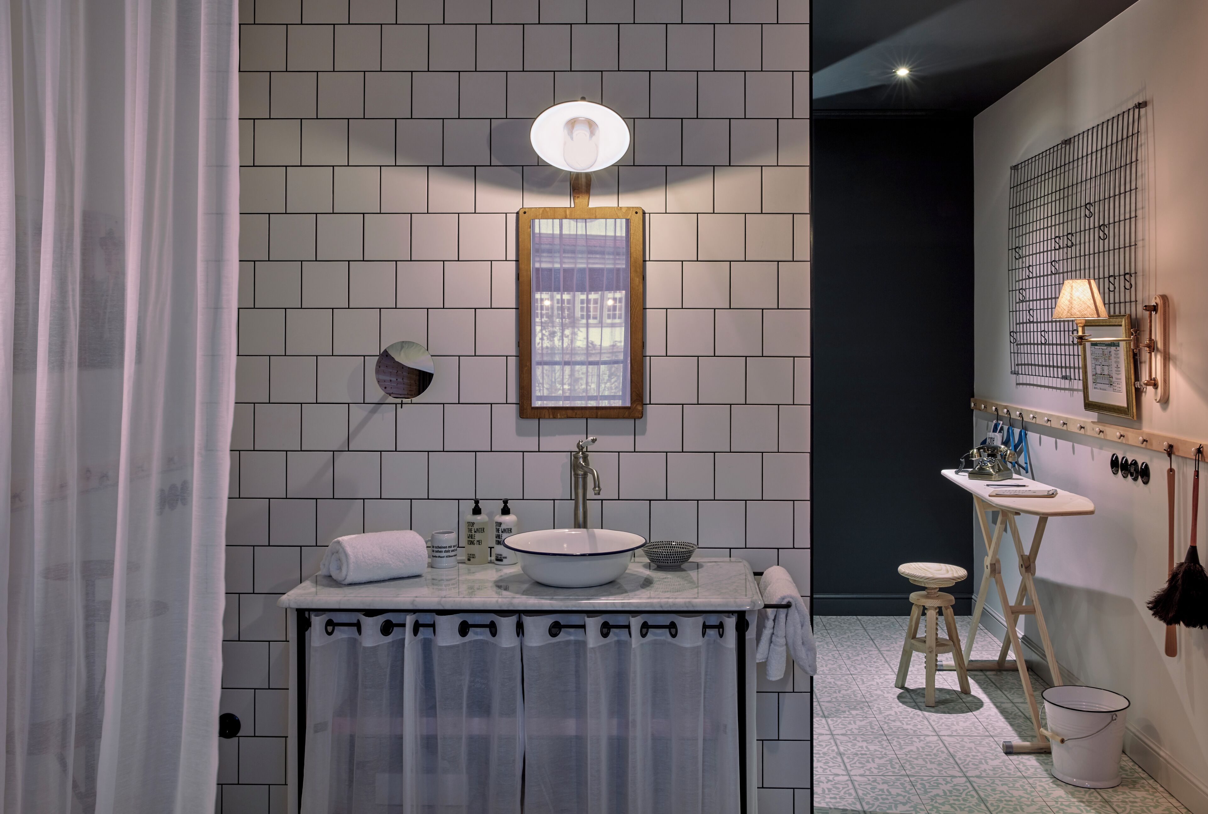 small | bathroom | shower, rainfall showerhead, designer toiletries, hair dryer