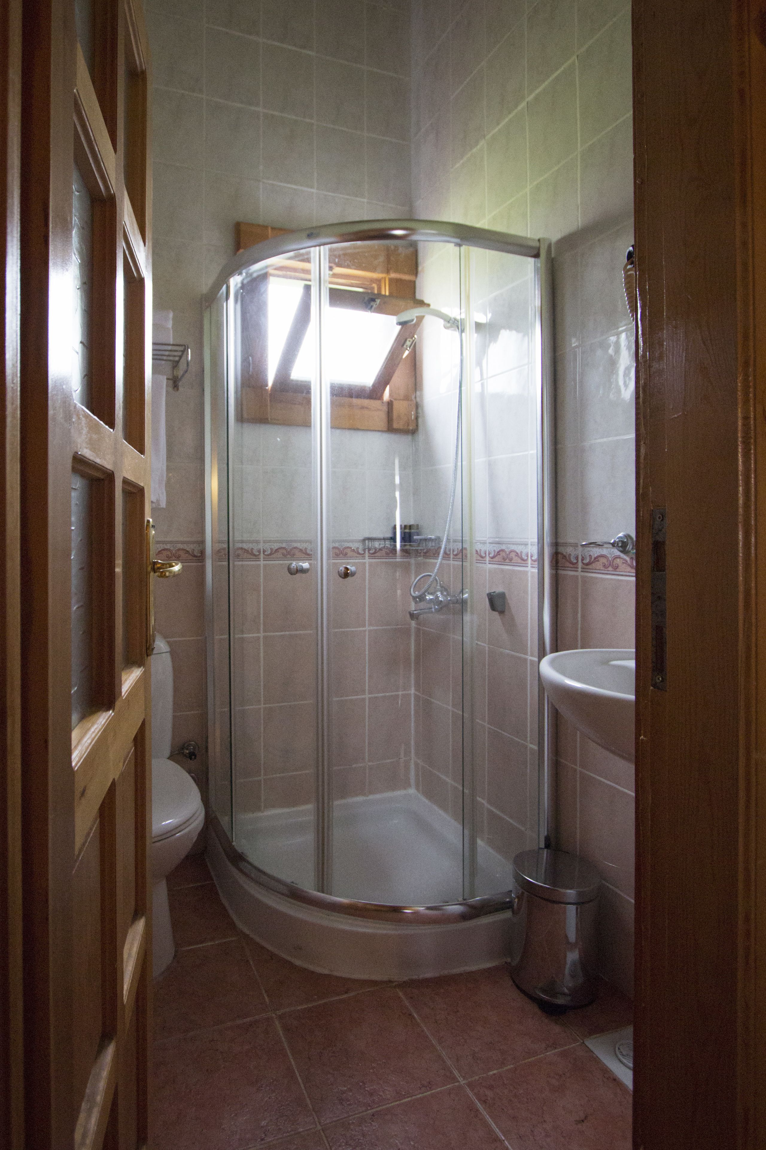 standard bungalow, 1 bedroom, balcony, mountain view | bathroom | shower, free toiletries, hair dryer, slippers