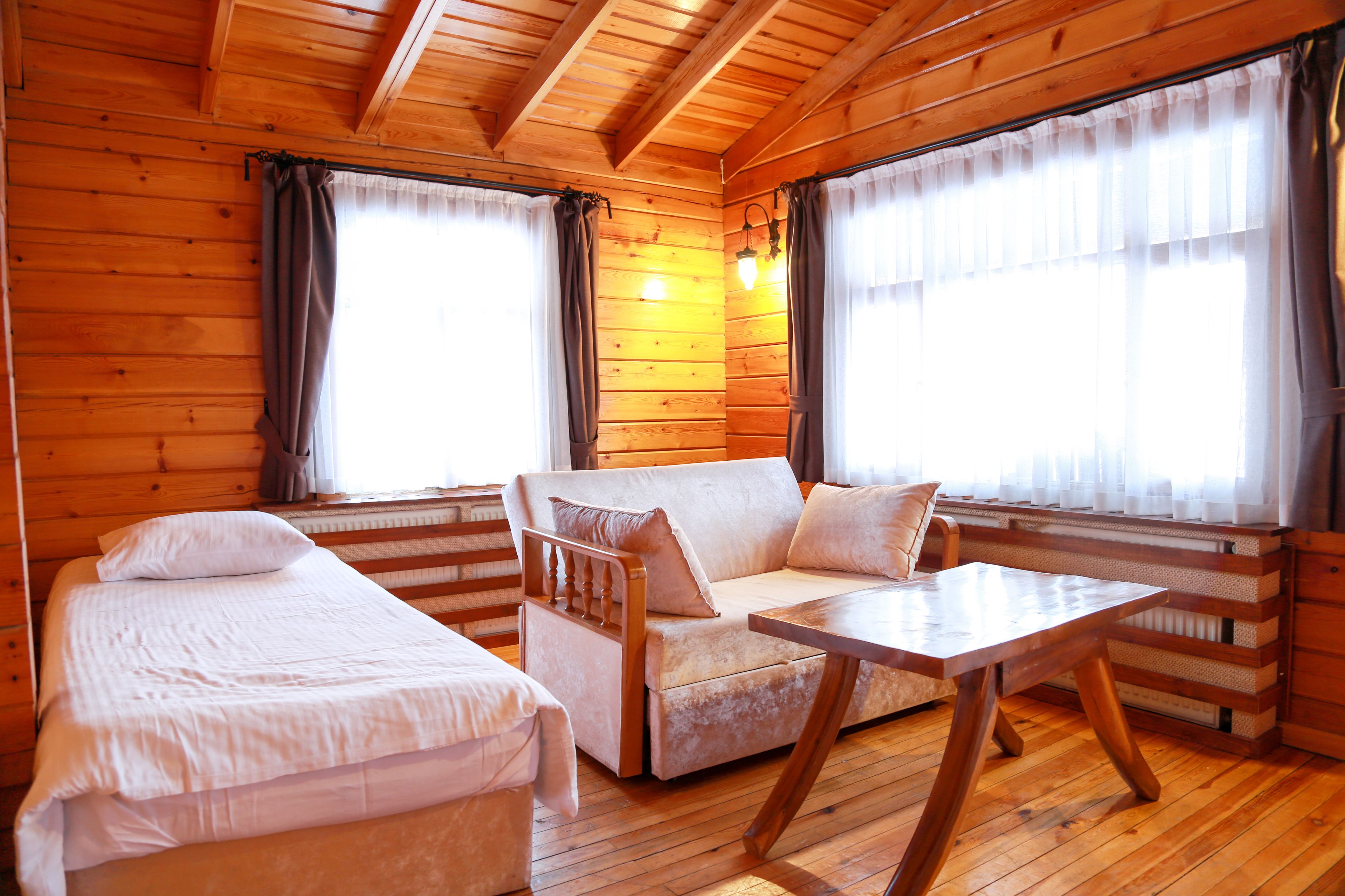 standard bungalow, 1 bedroom, balcony, mountain view | living room | lcd tv