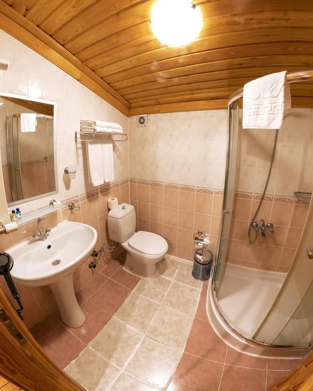 standard room | bathroom | shower, free toiletries, hair dryer, slippers