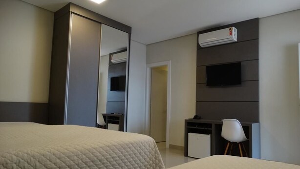 Superior Apartment | Minibar, in-room safe, desk, blackout curtains - Cynn Hotels (São José dos Campos)