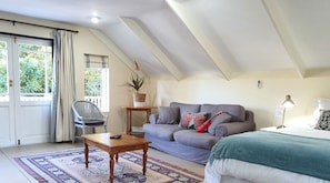 Suite (Loft) | Zona de estar | Una televisión de pantalla plana
