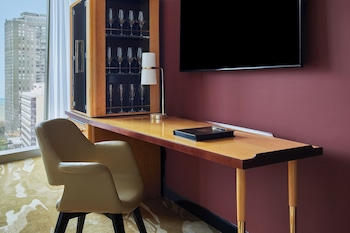 Egyptian cotton sheets, premium bedding, down comforters, minibar at Viceroy Chicago