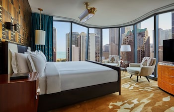 Egyptian cotton sheets, premium bedding, down comforters, minibar at Viceroy Chicago
