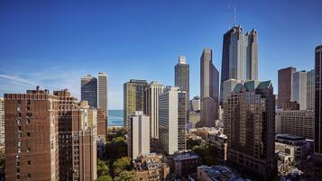 A cityscape with a variety of high-rise buildings, including some with distinctive architectural features.