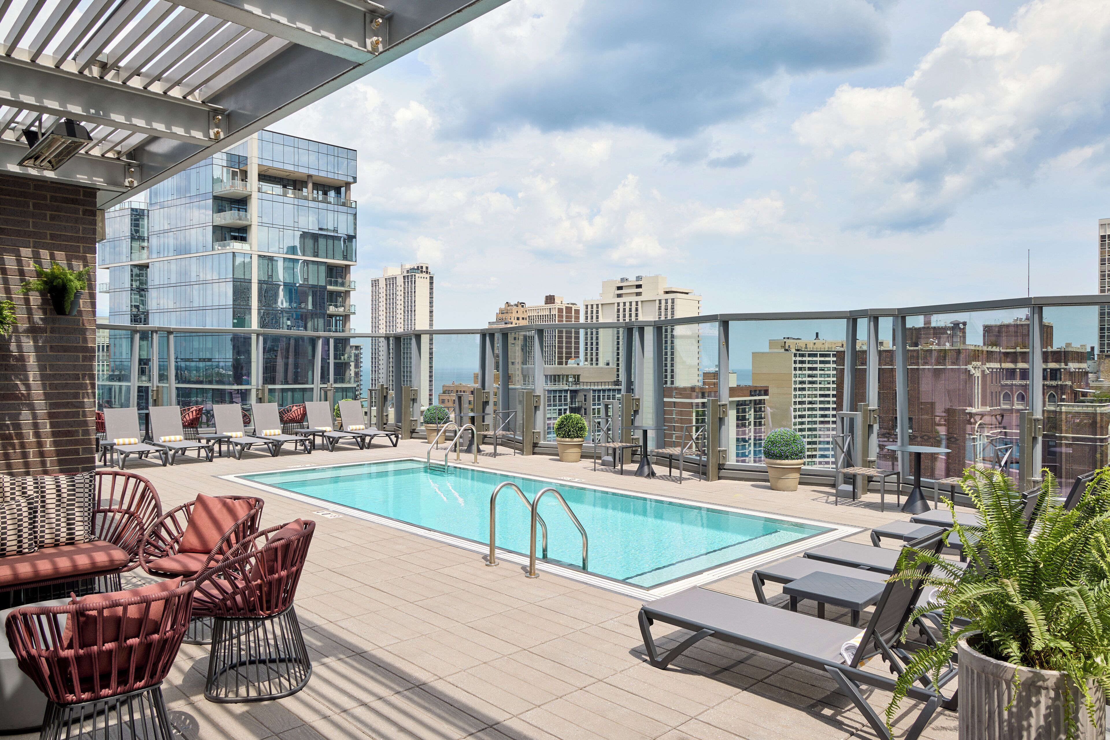 seasonal outdoor pool, open 8:00 am to 5:00 pm, pool loungers