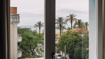 Premium bedding, down comforters, in-room safe, desk