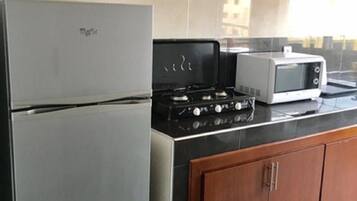 Apartment (for 7 persons) | Private kitchen | Full-size fridge, microwave, stovetop, coffee/tea maker
