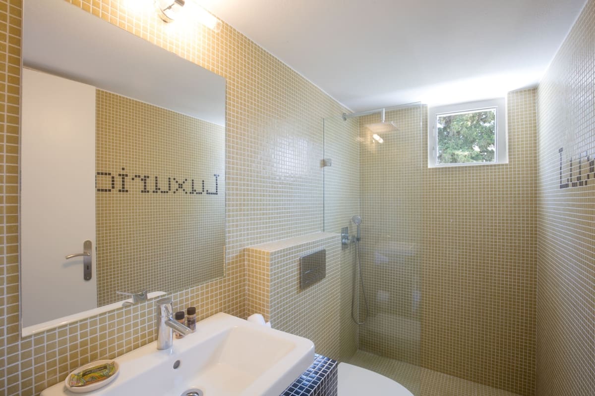 superior double room, balcony | bathroom | shower, eco-friendly toiletries, hair dryer, towels