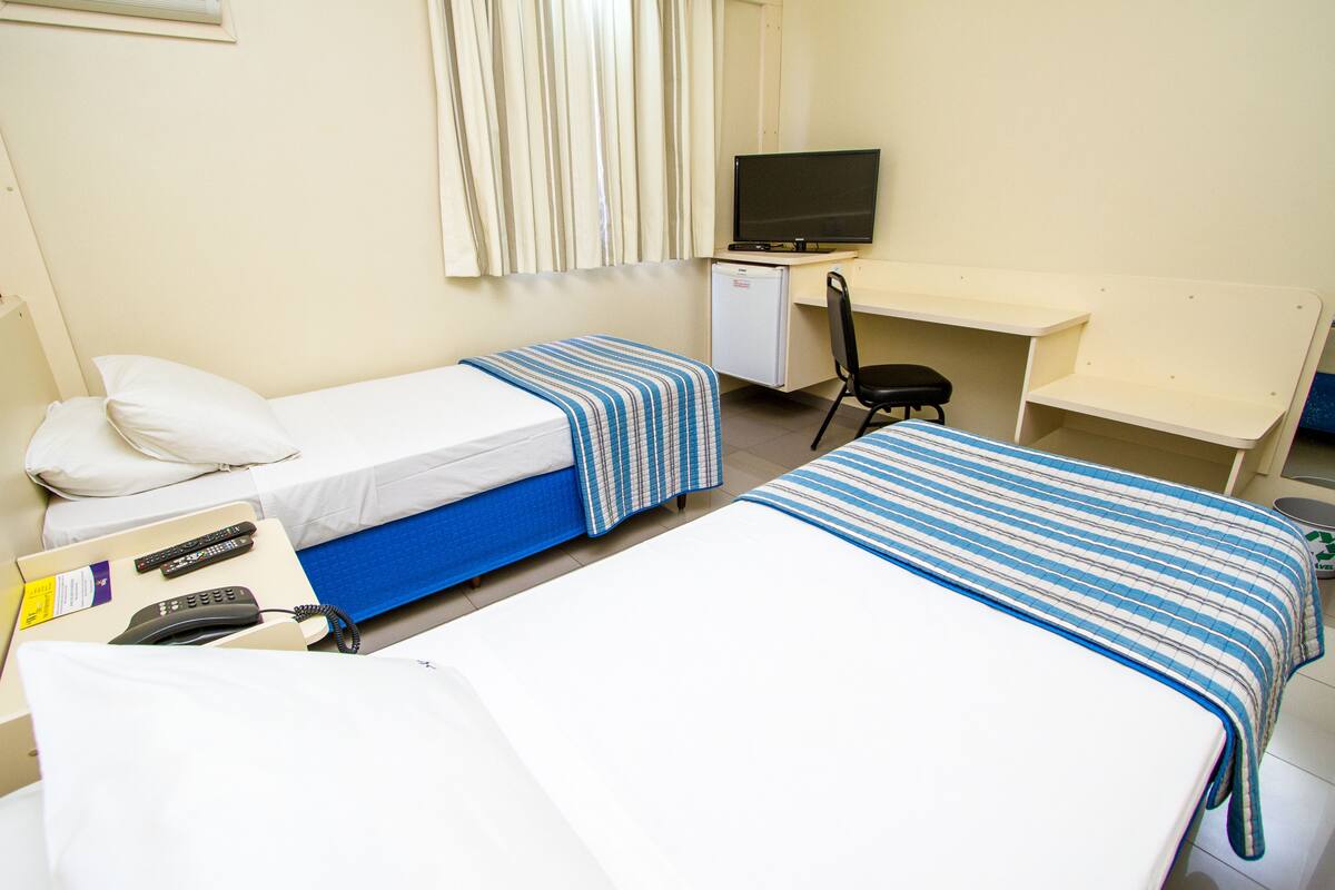 deluxe twin room, 2 single beds | minibar, in-room safe, desk, blackout curtains