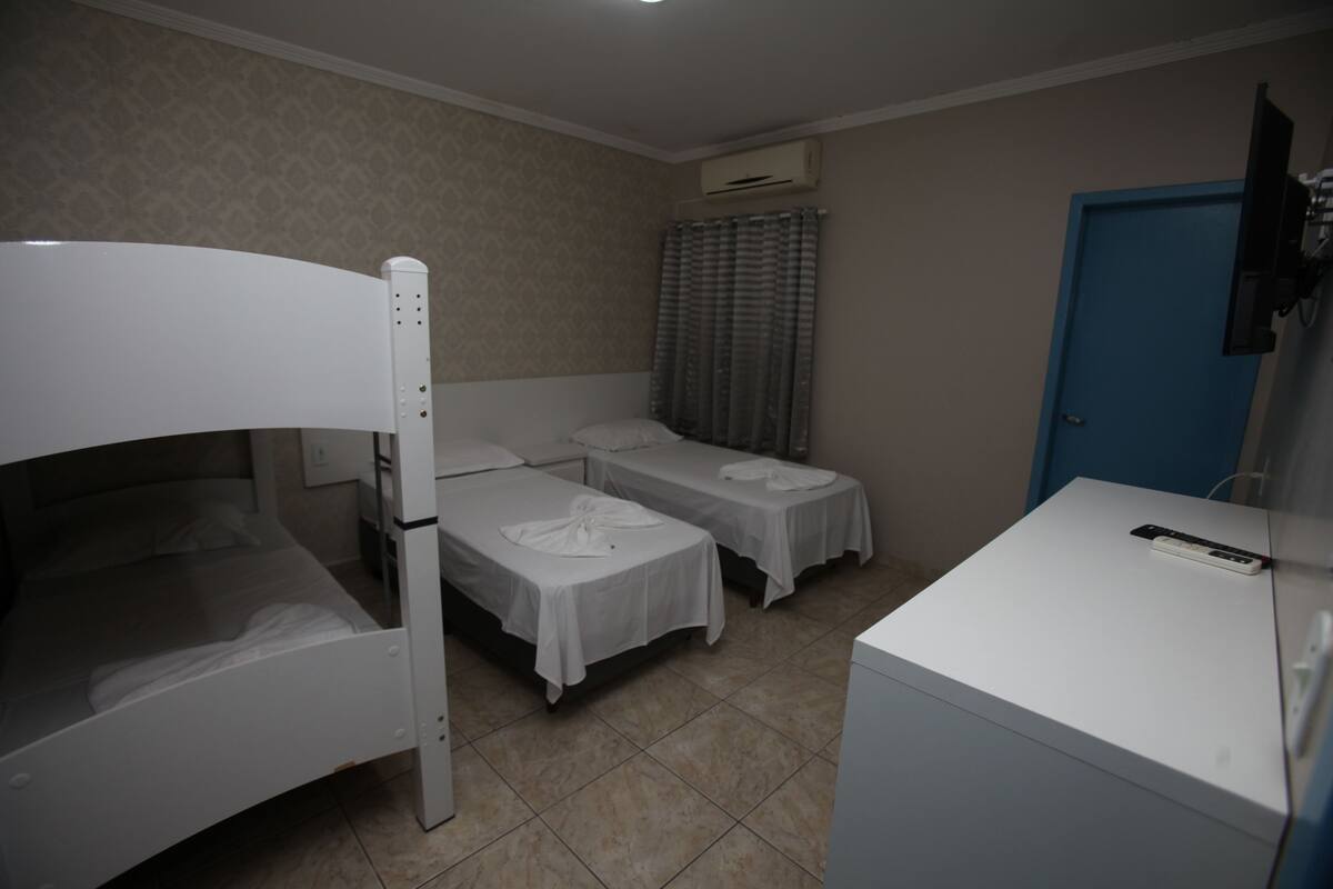 Quadruple Room | Minibar, desk, WiFi (free), bed sheets