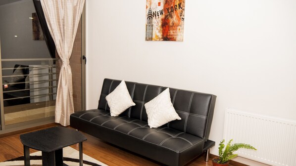 Standard Apartment, Private Bathroom | Living room | Smart TV