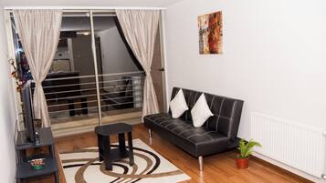 Standard Apartment, Private Bathroom | Living area | Smart TV