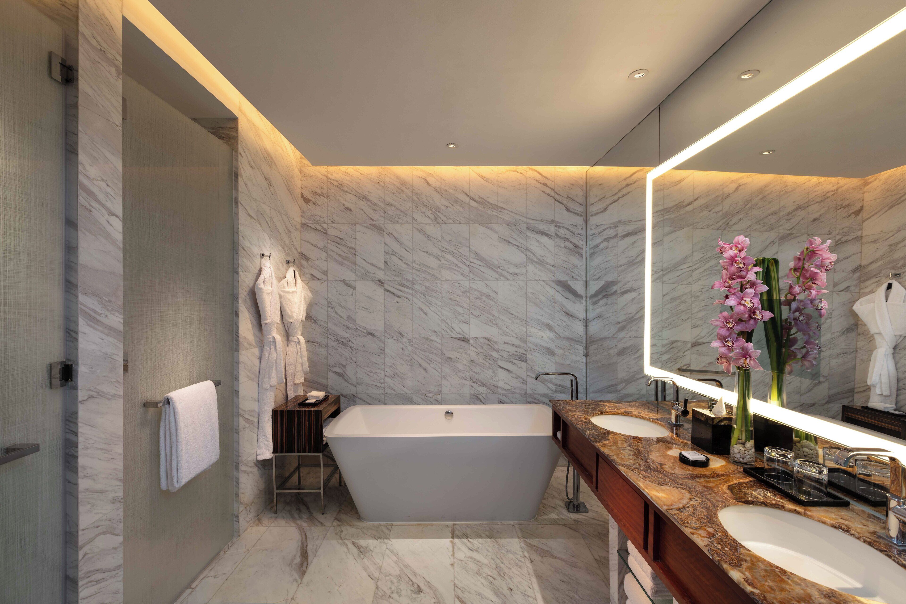 grand executive suite | bathroom | designer toiletries, hair dryer, bathrobes, slippers