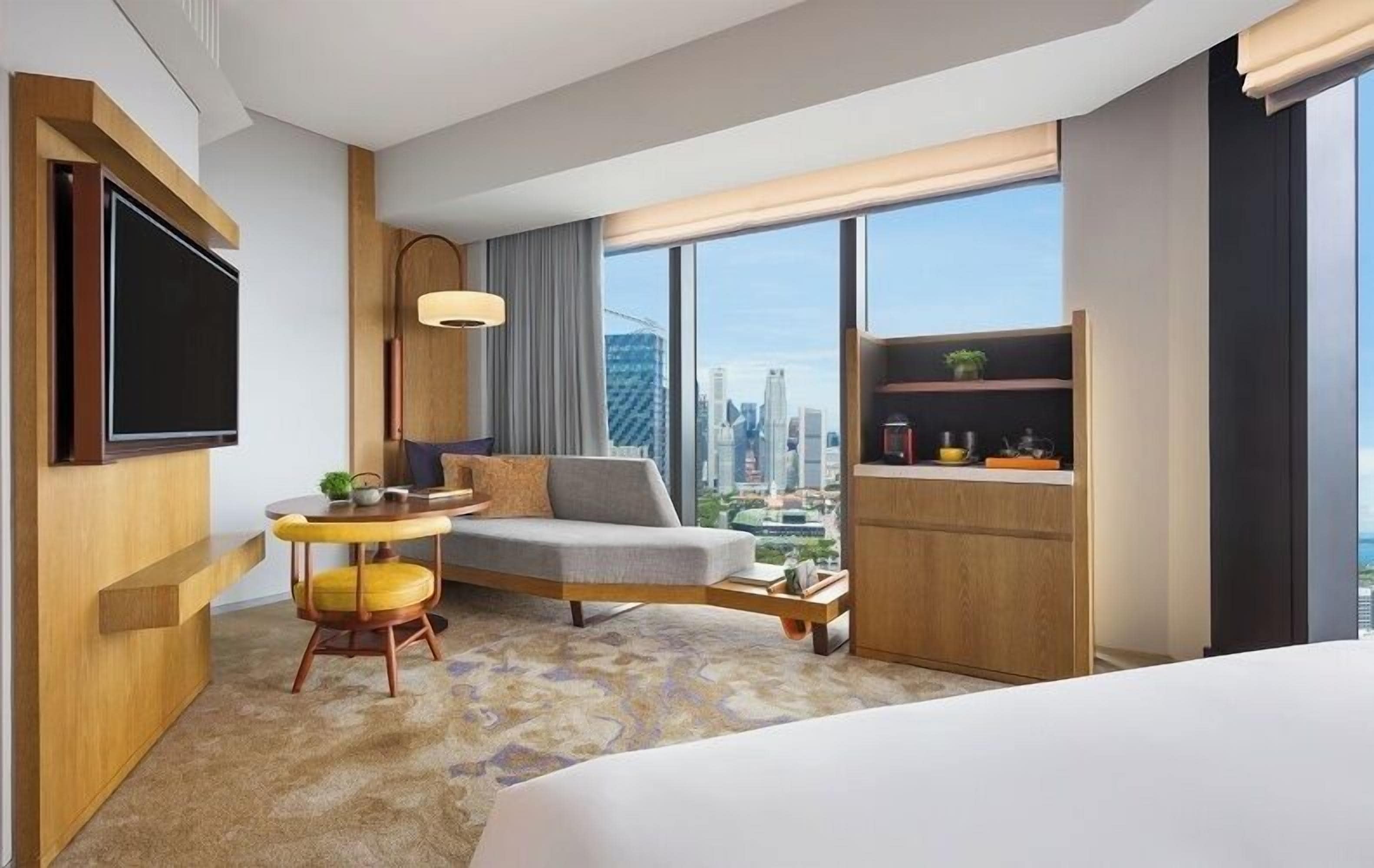 Kamar Deluks, 1 Tempat Tidur King, pemandangan kota, sudut | 1 kamar tidur, seprai premium, minibar, dan brankas