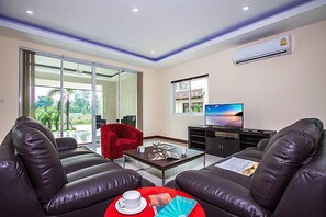 3-Bedroom Villa  | Living room | Flat-screen TV, DVD player