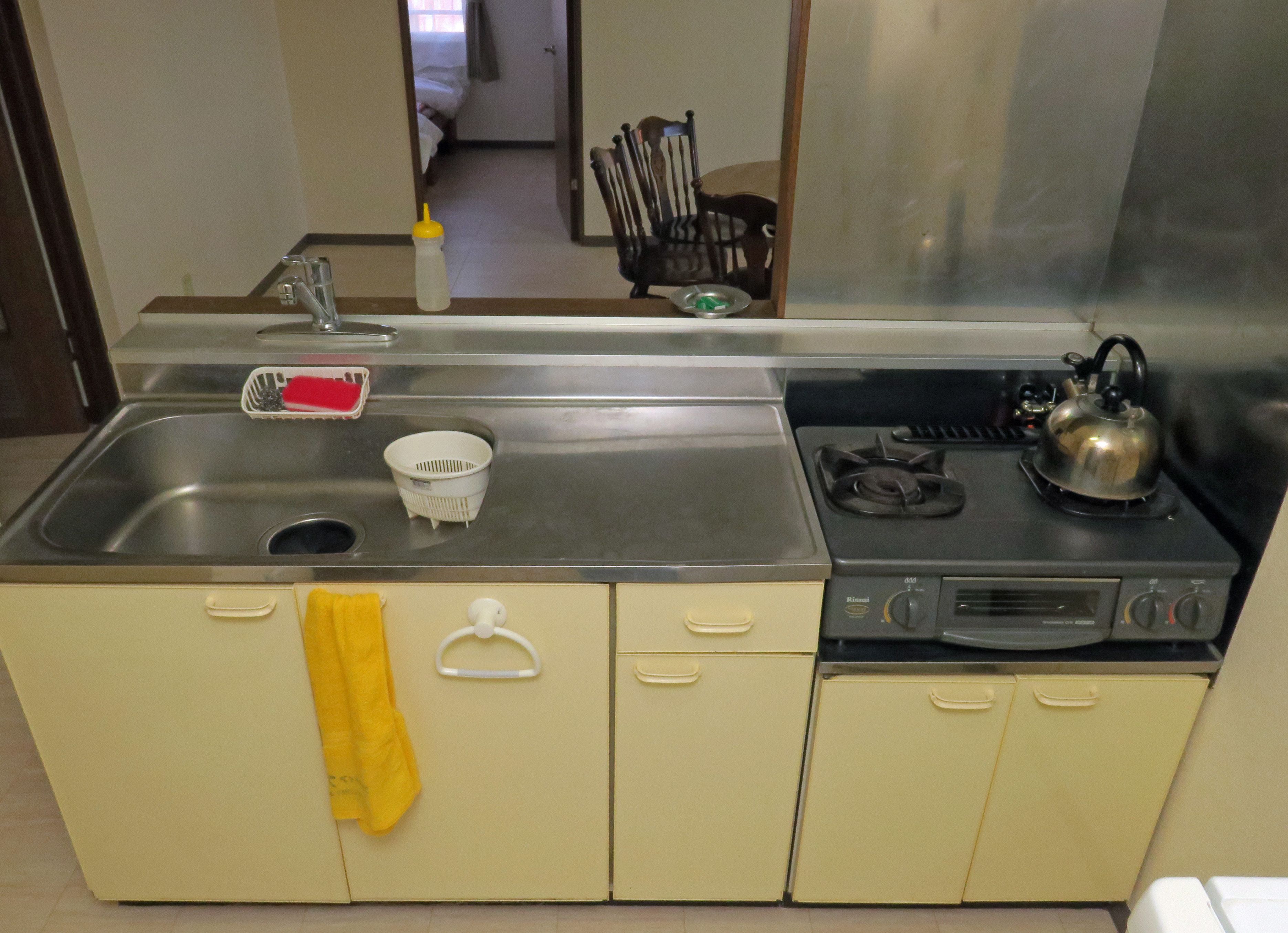 fridge, microwave, stovetop, electric kettle