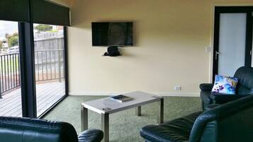 House, 2 Bedrooms | Living area | Flat-screen TV, DVD player