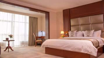 Deluxe King Room | Premium bedding, in-room safe, desk, laptop workspace