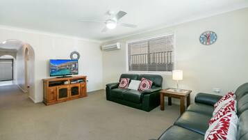 Family House, 2 Bedrooms | Living room | Flat-screen TV