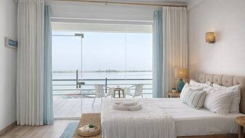 Premium bedding, pillow-top beds, desk, laptop workspace