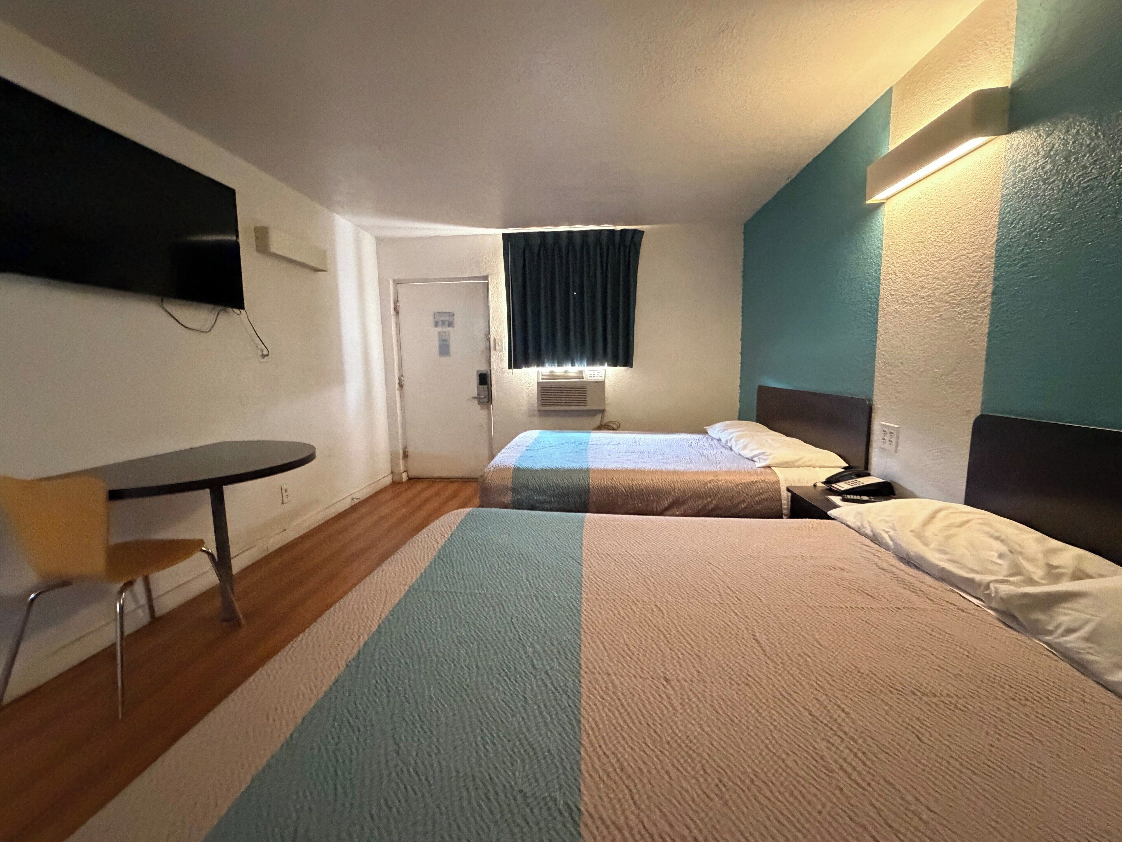 Chambre, 2 grands lits, non-fumeurs, coin cuisine | Wi-Fi gratuit, draps fournis