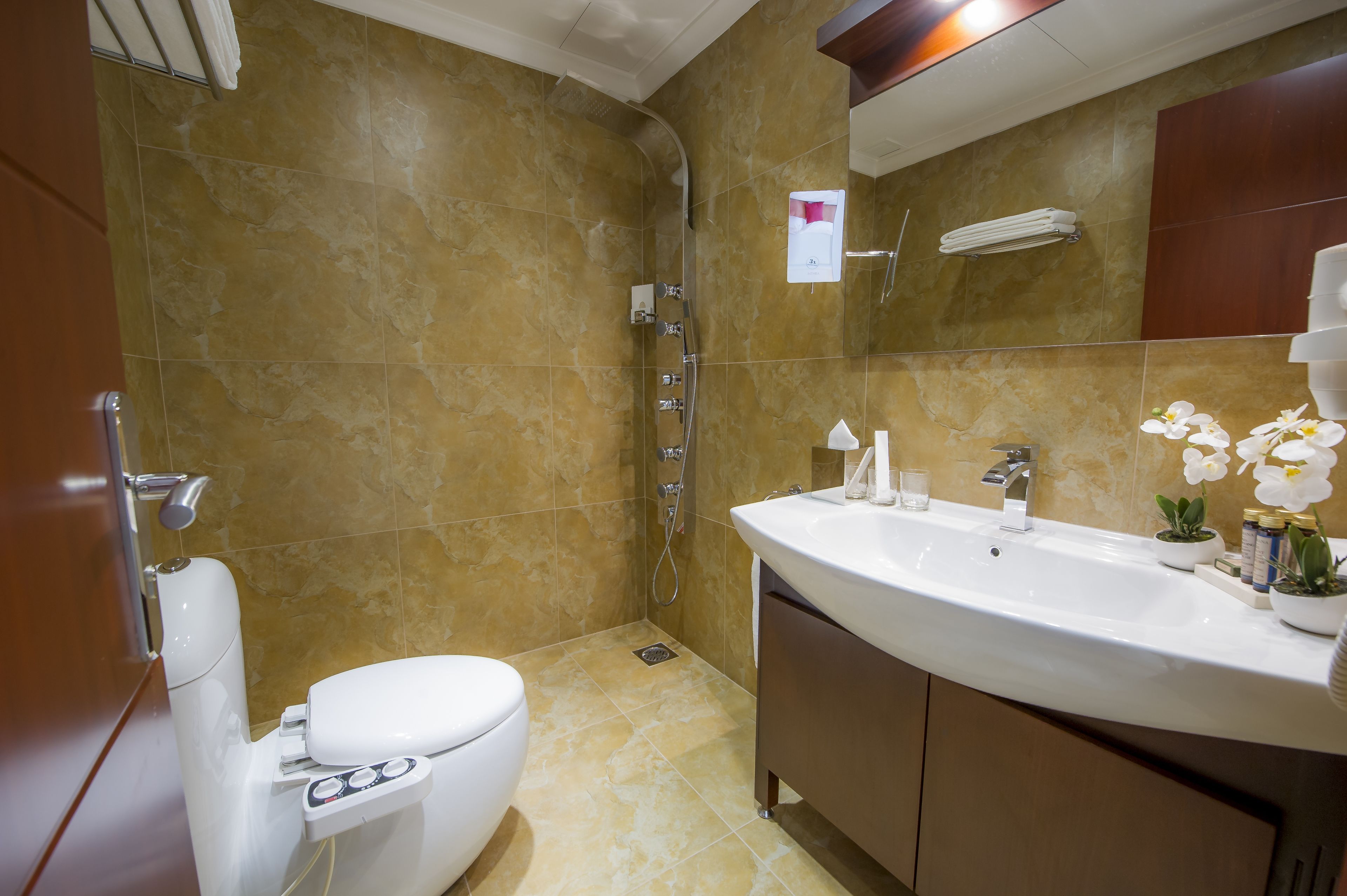 deep-soaking bathtub, free toiletries, hair dryer, bathrobes