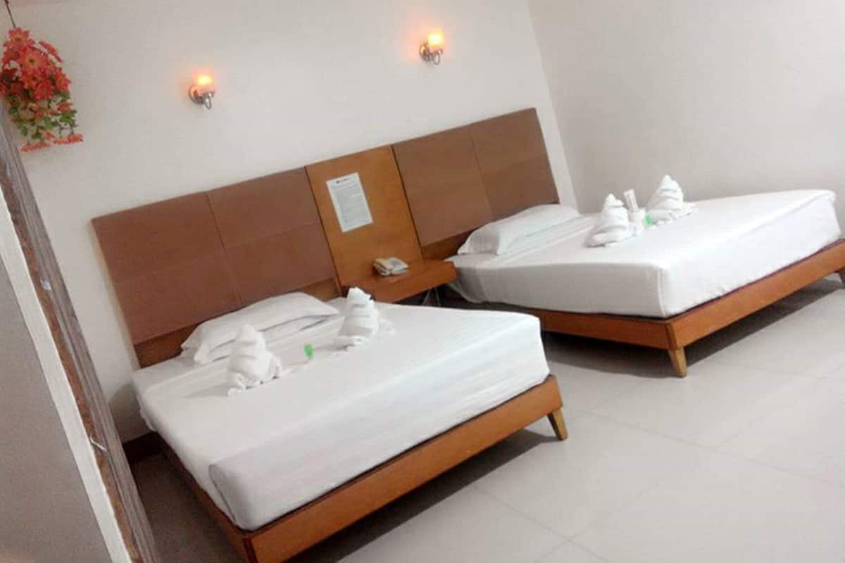Family Room | Desk, bed sheets
