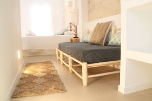 Triple Room | Desk, blackout drapes, free WiFi
