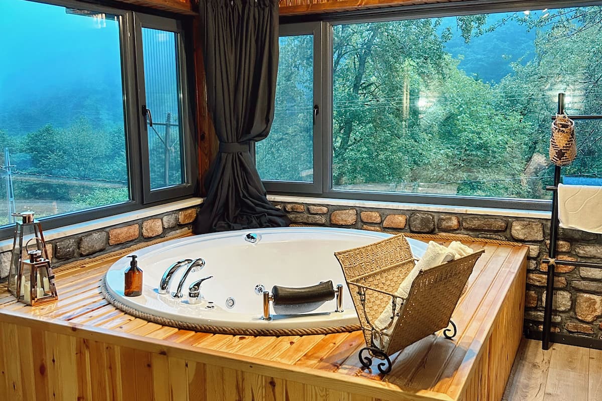 luxury room, 1 king bed, jetted tub, valley view | 1 bedroom, premium bedding, desk, laptop workspace