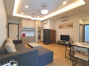Family Apartment, 2 Bedrooms, Non Smoking, Garden View | Living area | LED TV