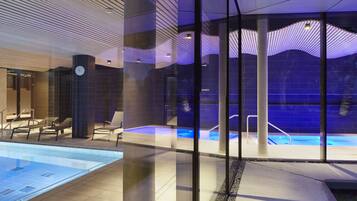 Indoor pool, open 7:00 AM to 10:00 PM, pool loungers