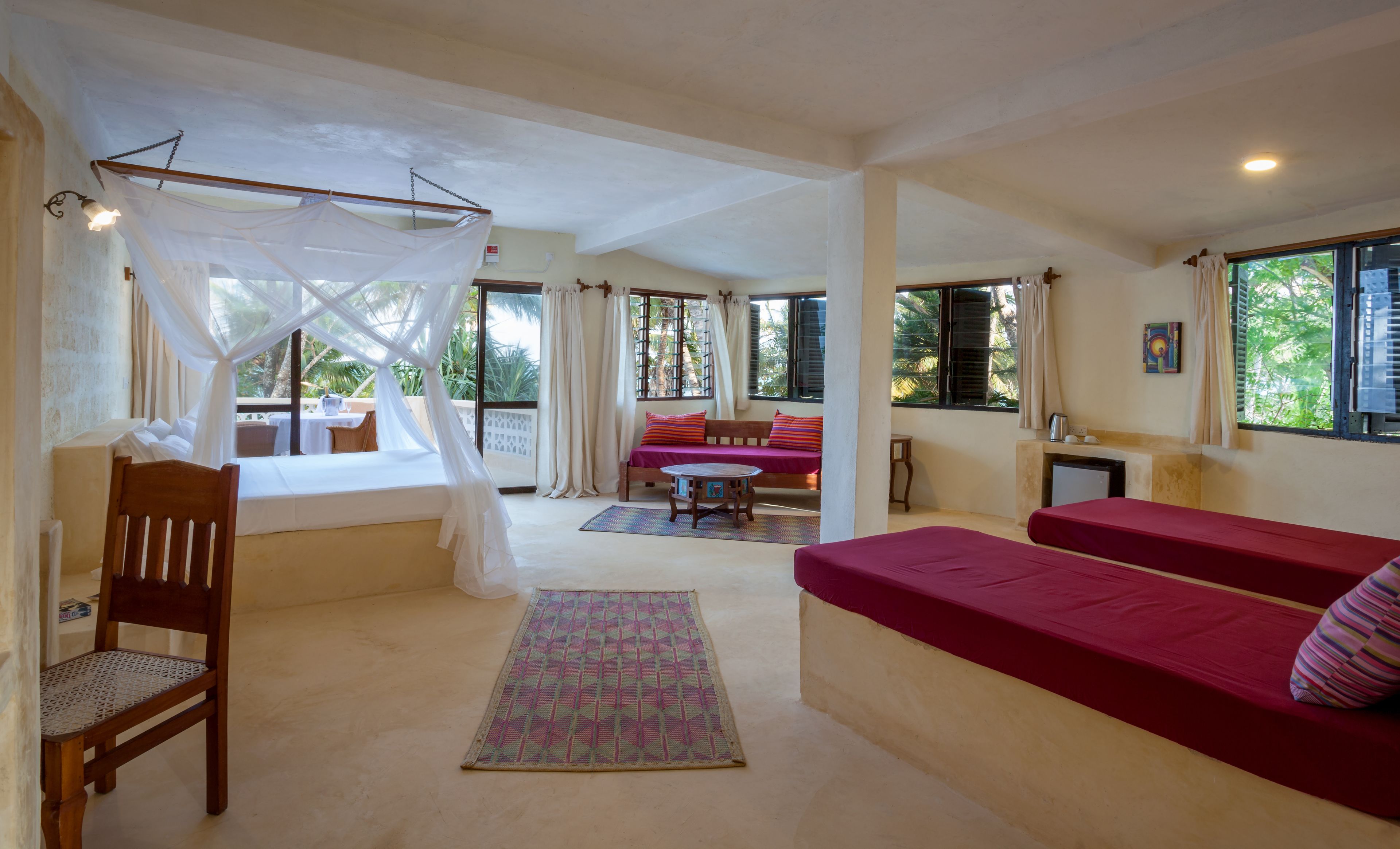 senior quadruple room, 1 bedroom, ocean view | 1 bedroom, minibar, in-room safe, desk