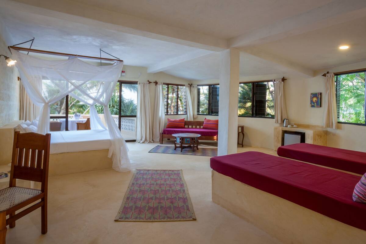 senior quadruple room, 1 bedroom, ocean view | 1 bedroom, minibar, in-room safe, desk