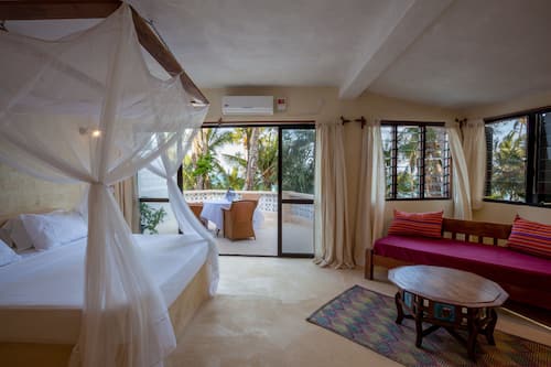 Senior Quadruple Room, 1 Bedroom, Ocean View | Minibar, in-room safe, desk, free WiFi