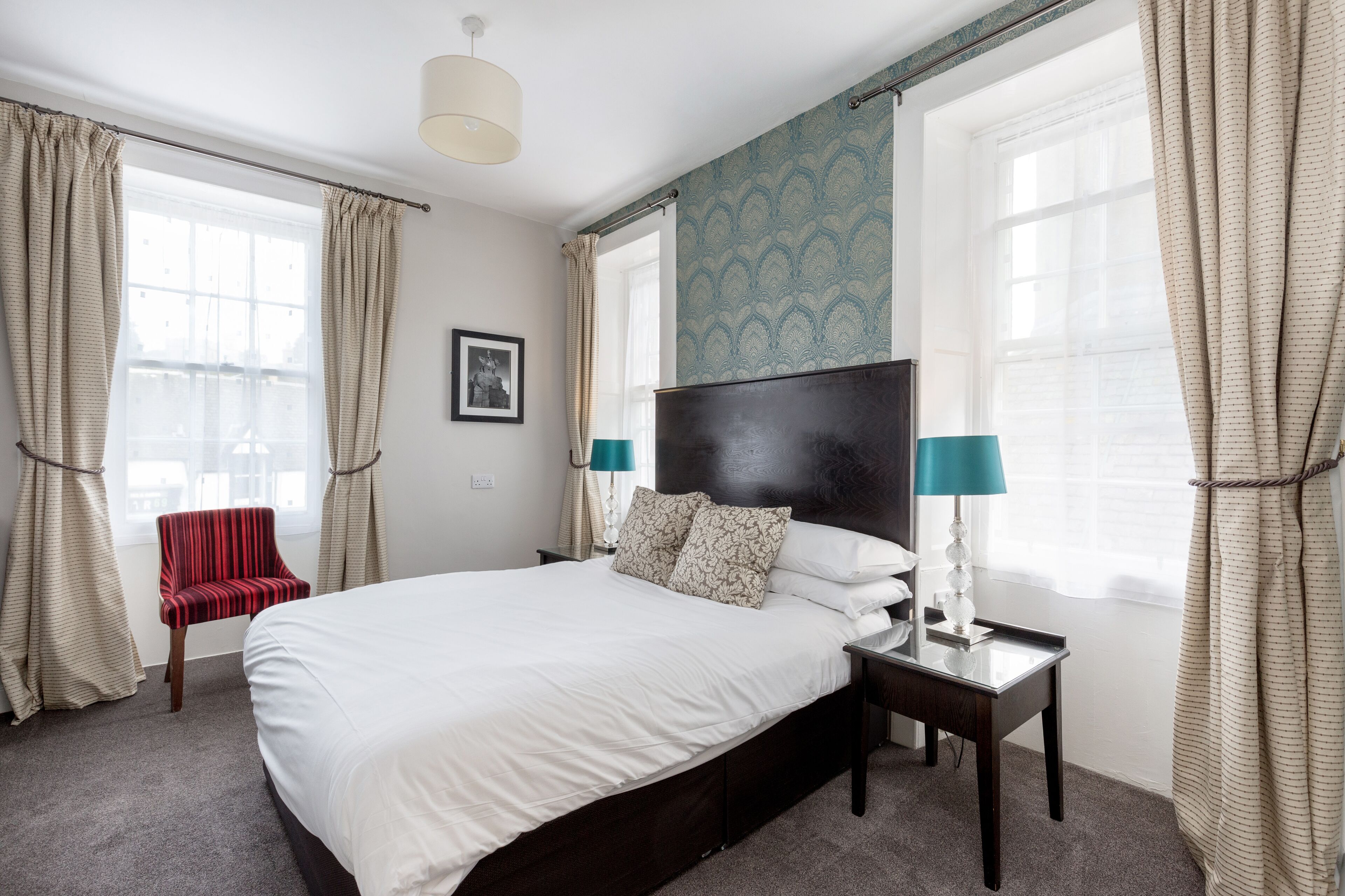 standard quadruple room, ensuite | individually decorated, desk, laptop workspace, blackout curtains