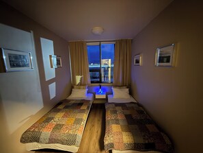 Economy Double or Twin Room, Shared Bathroom | Blackout drapes, free WiFi, bed sheets - Hotel Dalvik - Aurora Leisure (Dalvik)