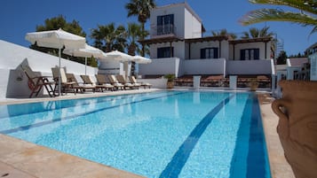 Outdoor pool, open 9:00 AM to 9:00 PM, pool umbrellas, sun loungers