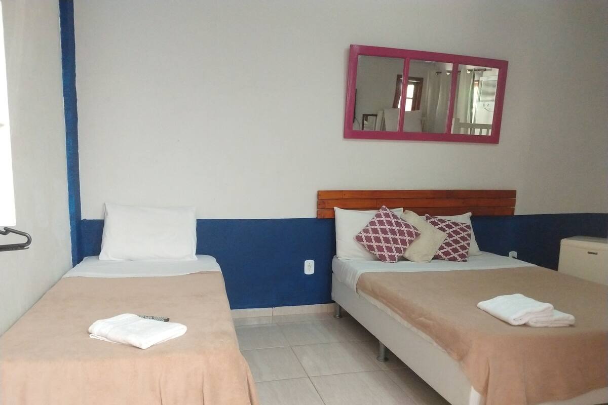 Standard Triple Room | Blackout curtains, iron/ironing board, cots/infant beds, rollaway beds